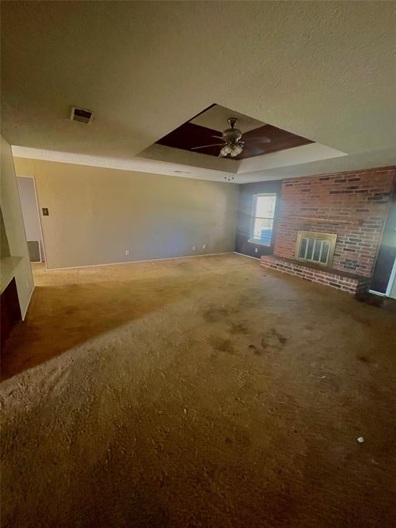925 42nd Street Southwest Paris, TX 75460 - Photo 10 of 14 a view of an empty room and chandelier fan