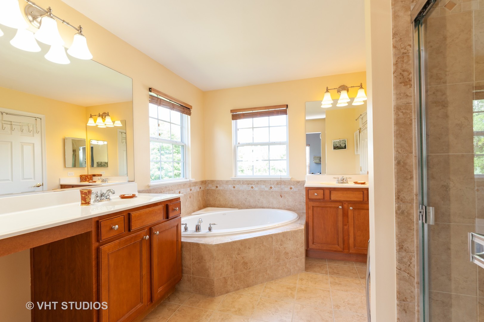 3148 Concord Lane Wadsworth, IL 60083 - Photo 9 of 19 a spacious bathroom with a tub sink shower and mirror