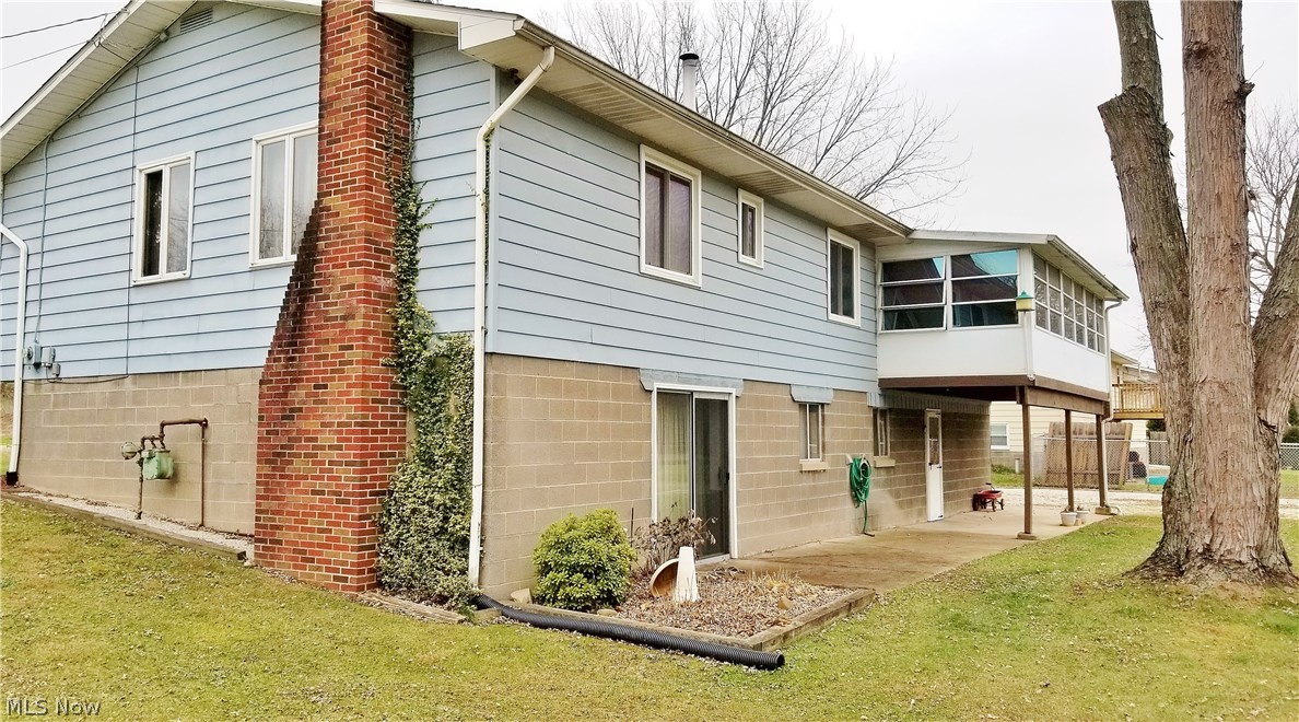 2888 Pressler Road Uniontown, OH 44685 - Photo 23 of 26 Lower level family room walks out. Garage access is under sun porch and covered patio.