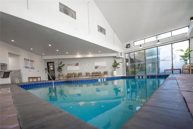 a view of a swimming pool and outdoor space