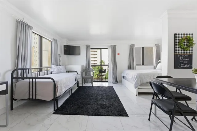 a bed room with a bed and a table