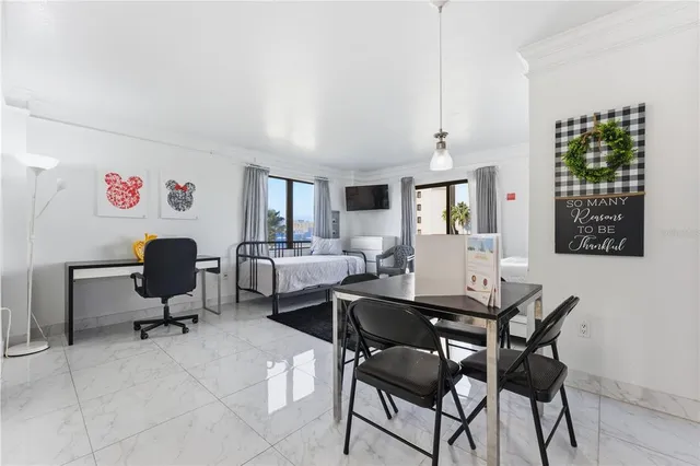 a workspace with furniture and a window