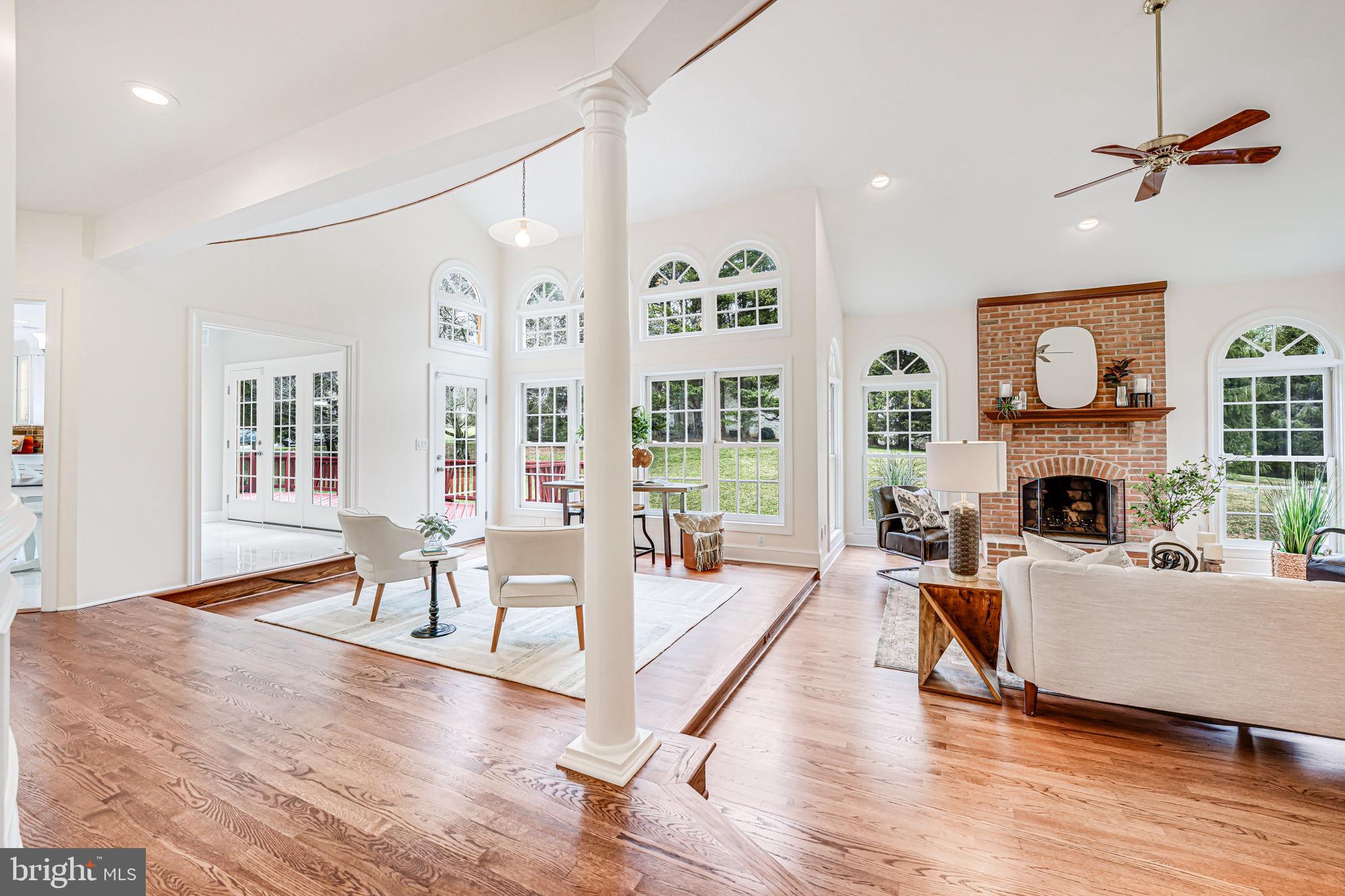 10800 Tradewind Drive Oakton, VA 22124 - Photo 12 of 77 a living room with fireplace furniture and a table