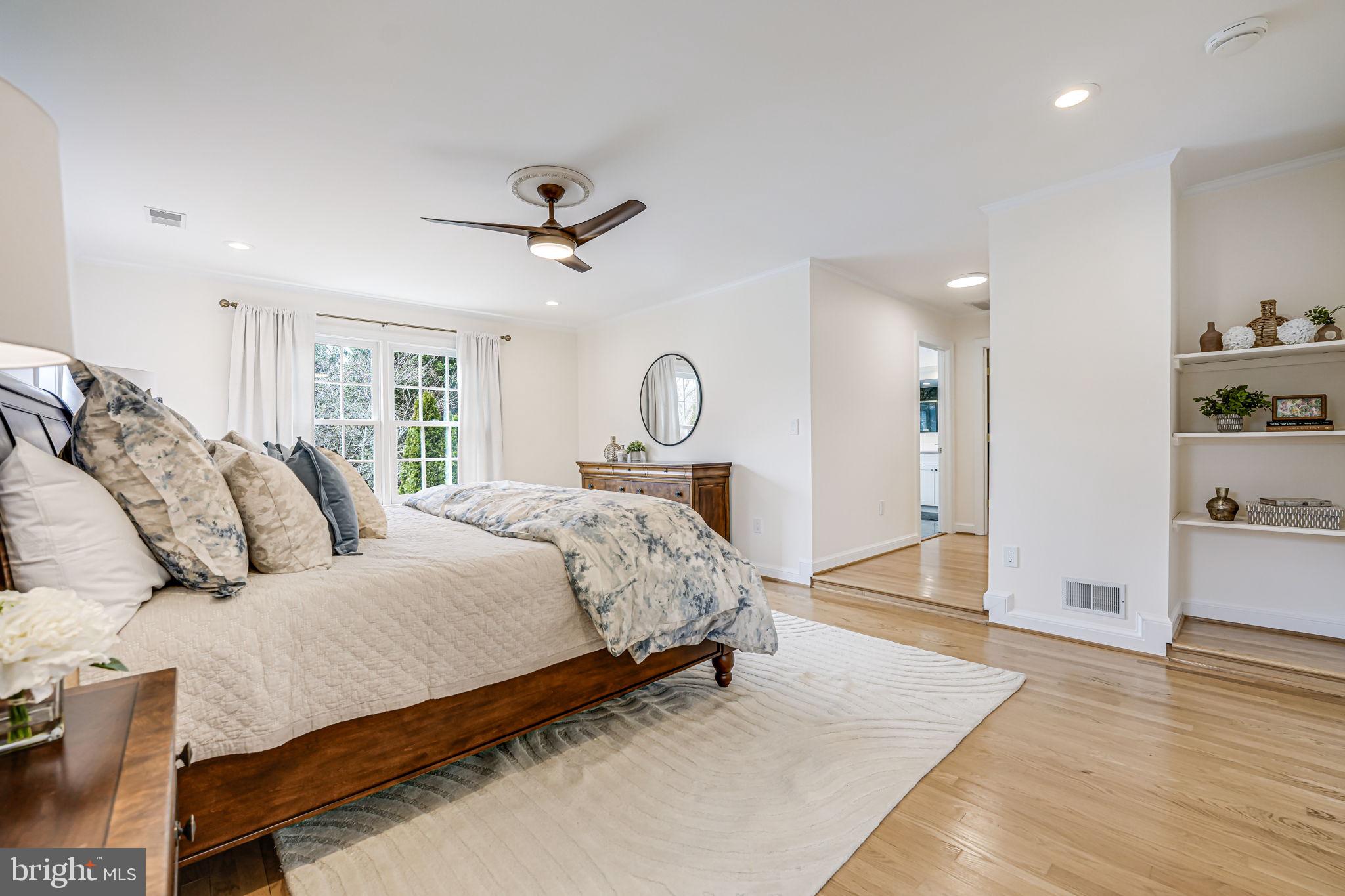 10800 Tradewind Drive Oakton, VA 22124 - Photo 35 of 77 a bed room with a bed and dresser