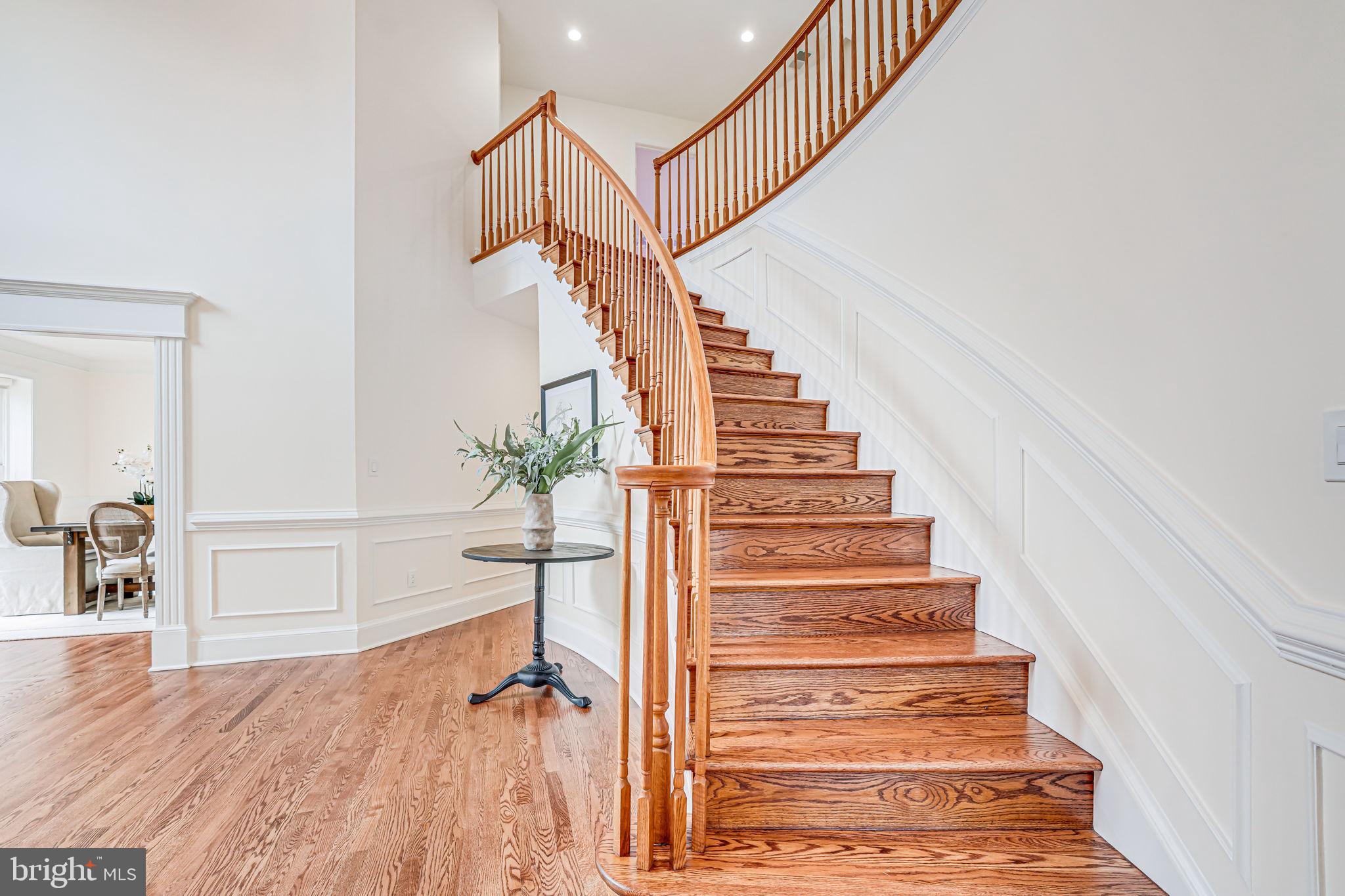 10800 Tradewind Drive Oakton, VA 22124 - Photo 6 of 77 a view of entryway and hall with wooden floor