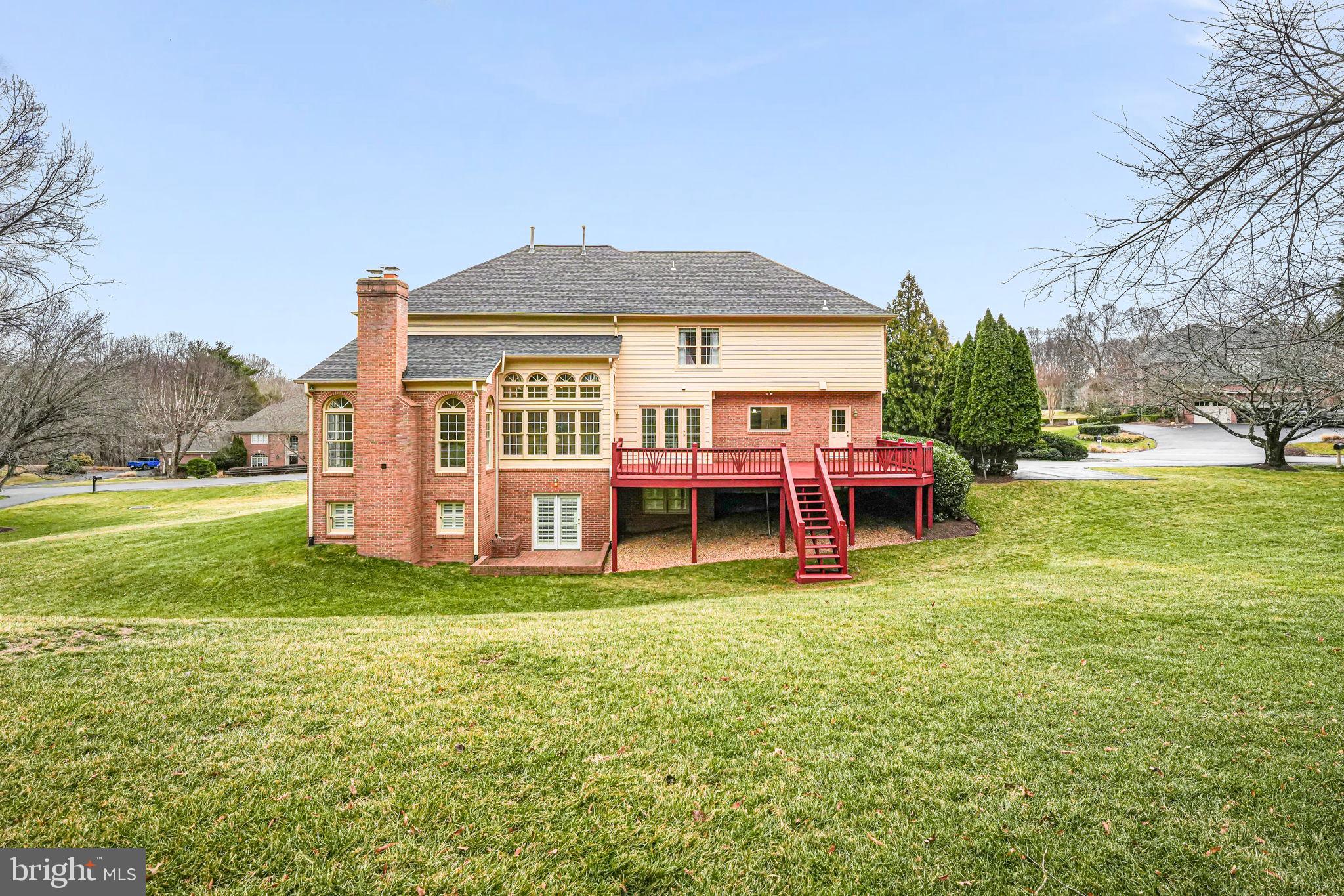 10800 Tradewind Drive Oakton, VA 22124 - Photo 67 of 77 a view of a house with a yard porch and sitting area