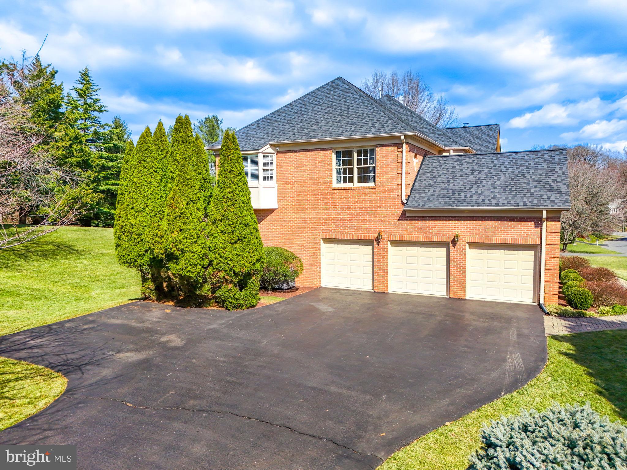10800 Tradewind Drive Oakton, VA 22124 - Photo 69 of 77 a front view of a house with a yard