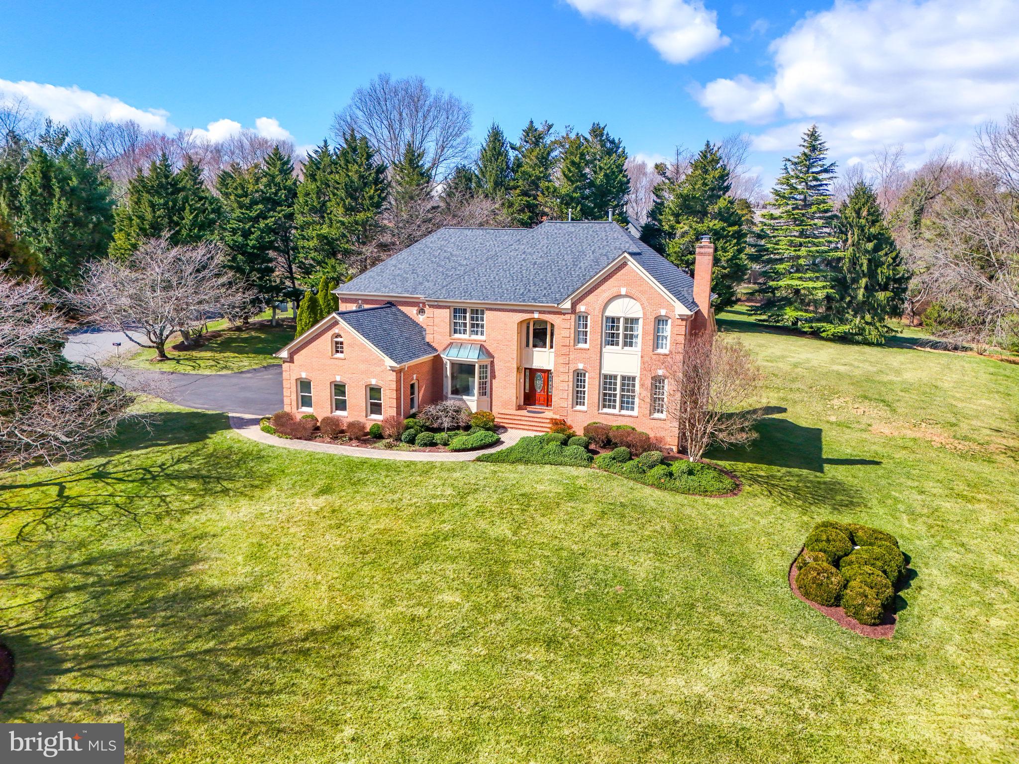 10800 Tradewind Drive Oakton, VA 22124 - Photo 73 of 77 a view of a house with a yard and sitting area