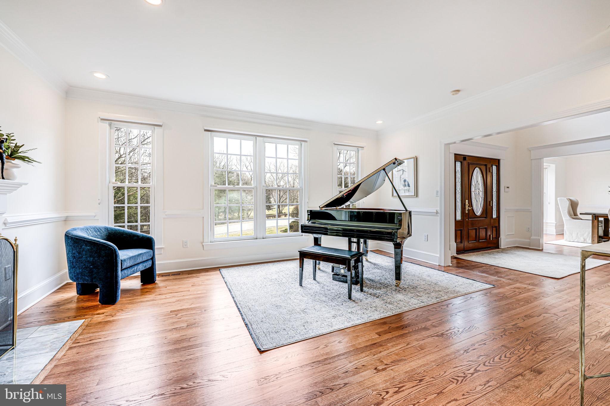 10800 Tradewind Drive Oakton, VA 22124 - Photo 8 of 77 a living room with furniture and a wooden floor