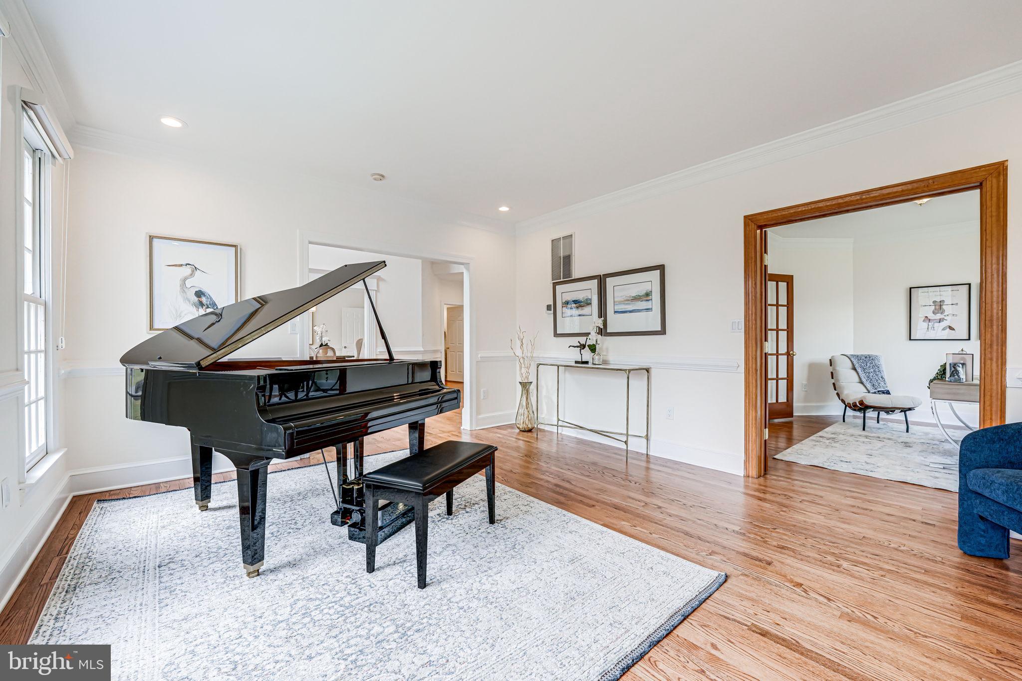 10800 Tradewind Drive Oakton, VA 22124 - Photo 9 of 77 a living room with furniture and a wooden floor