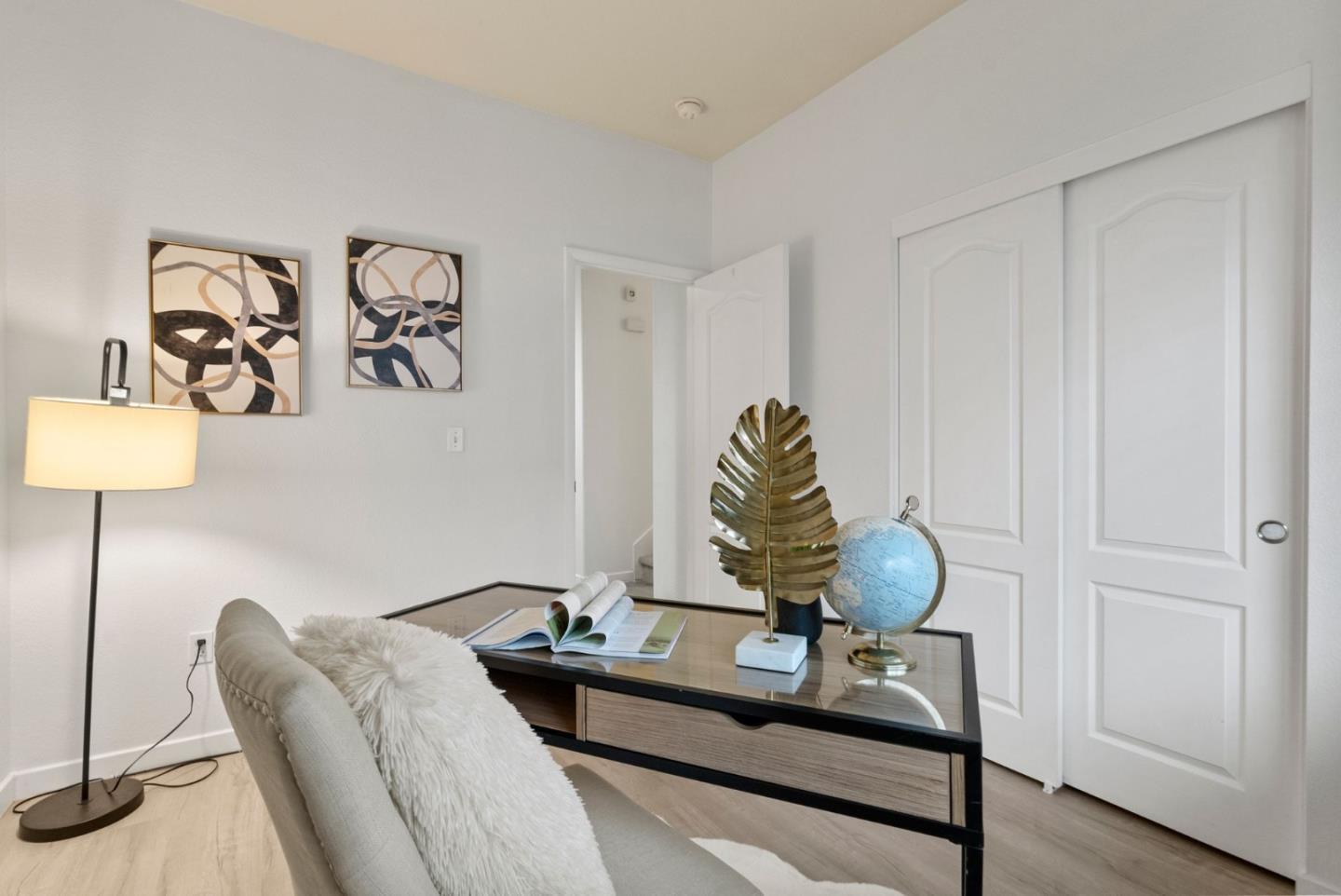 658 Kingsford Way Hayward, CA 94541 - Photo 13 of 38 a view of a workspace with furniture and wooden floor