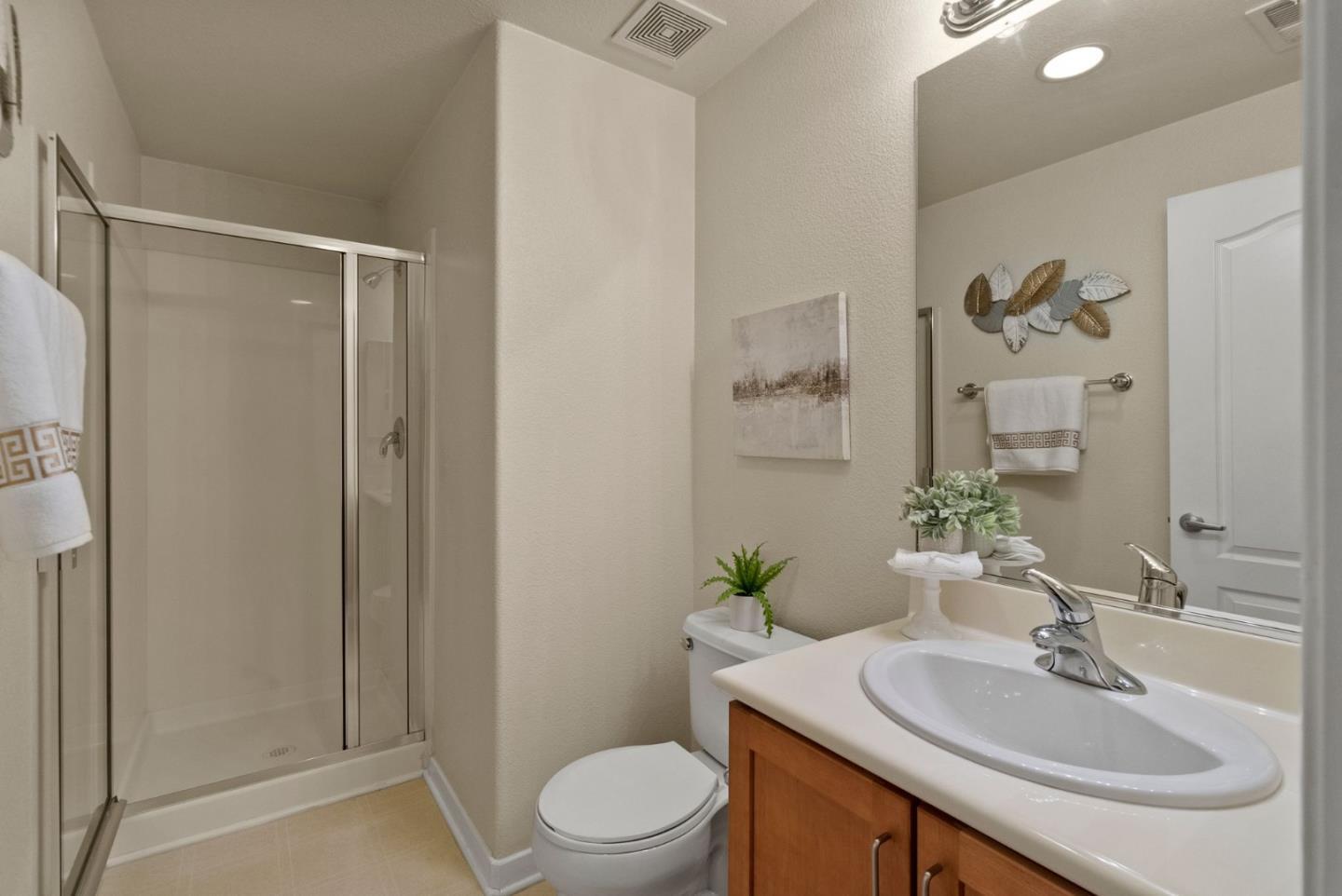 658 Kingsford Way Hayward, CA 94541 - Photo 15 of 38 a bathroom with a sink toilet and shower