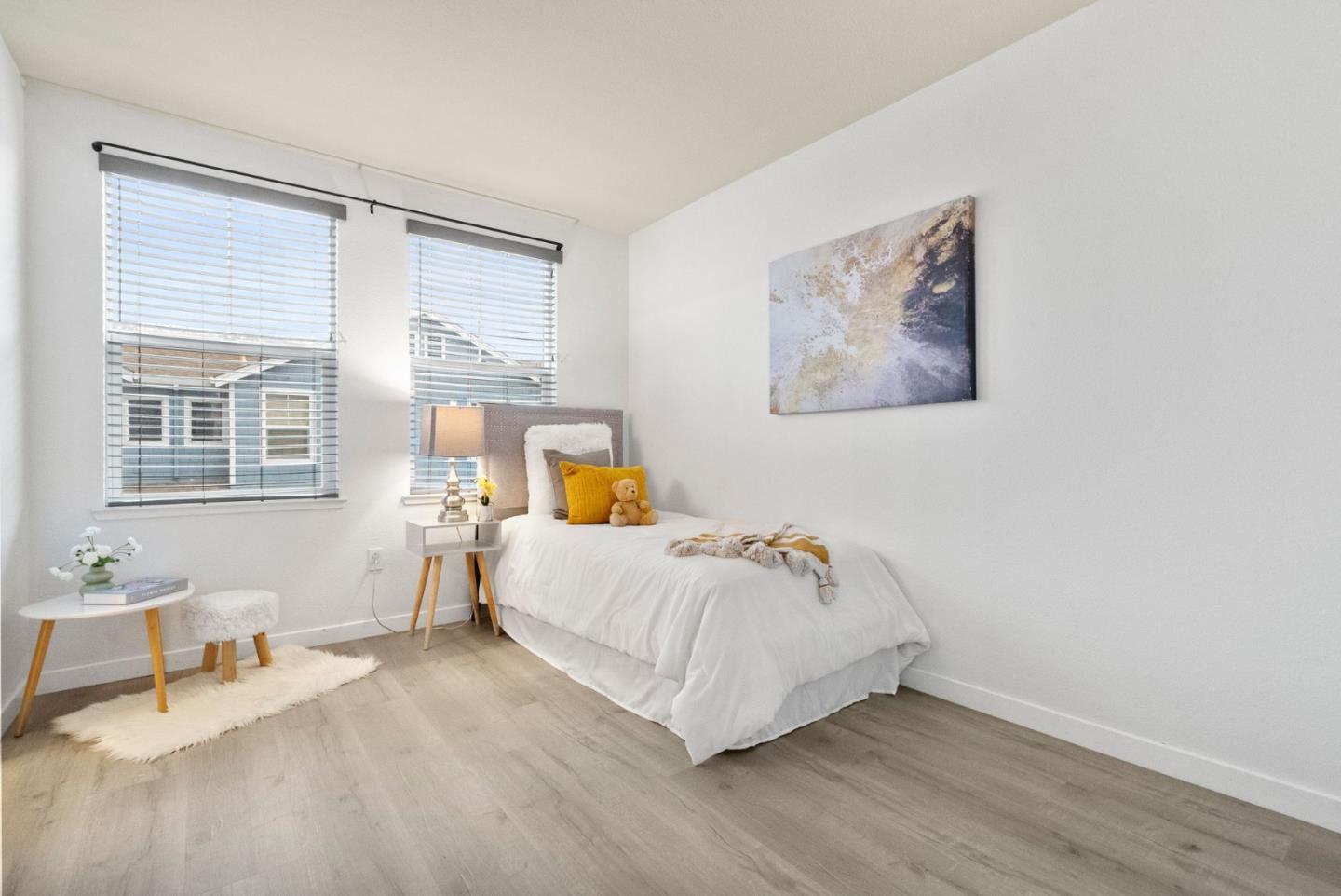 658 Kingsford Way Hayward, CA 94541 - Photo 21 of 38 a bedroom with a bed and wooden floor