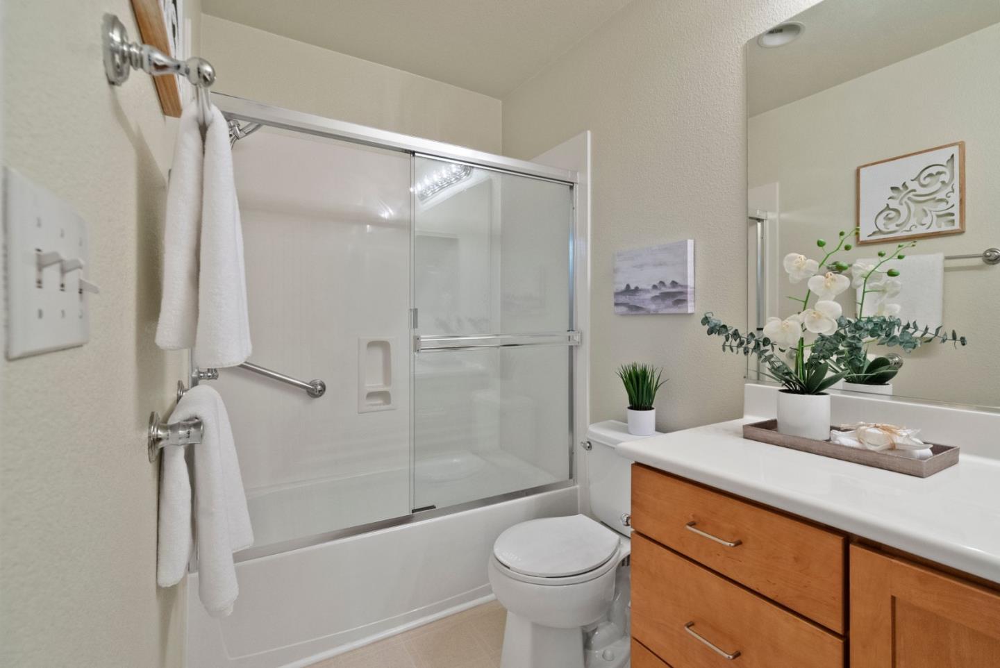 658 Kingsford Way Hayward, CA 94541 - Photo 22 of 38 a bathroom with a granite countertop sink toilet and shower
