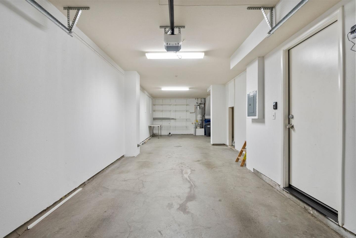 658 Kingsford Way Hayward, CA 94541 - Photo 26 of 38 a view of a hallway with wooden floor and windows