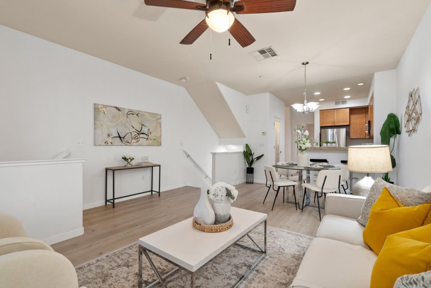 658 Kingsford Way Hayward, CA 94541 - Photo 6 of 38 a living room with furniture and a chandelier