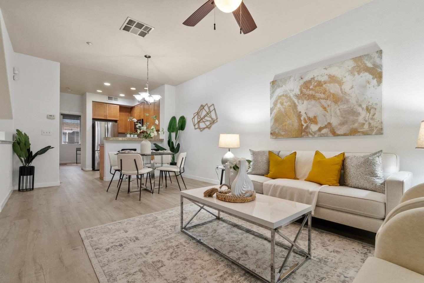 658 Kingsford Way Hayward, CA 94541 - Photo 7 of 38 a living room with furniture a chandelier and a table