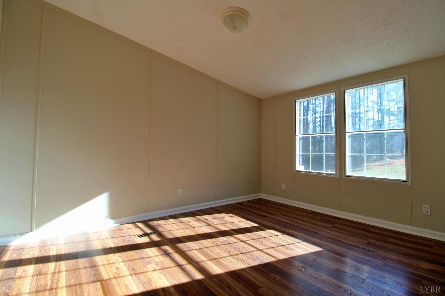 1908 Holiday Lake Road Appomattox, VA 24522 - Photo 20 of 35 a view of an empty room and window