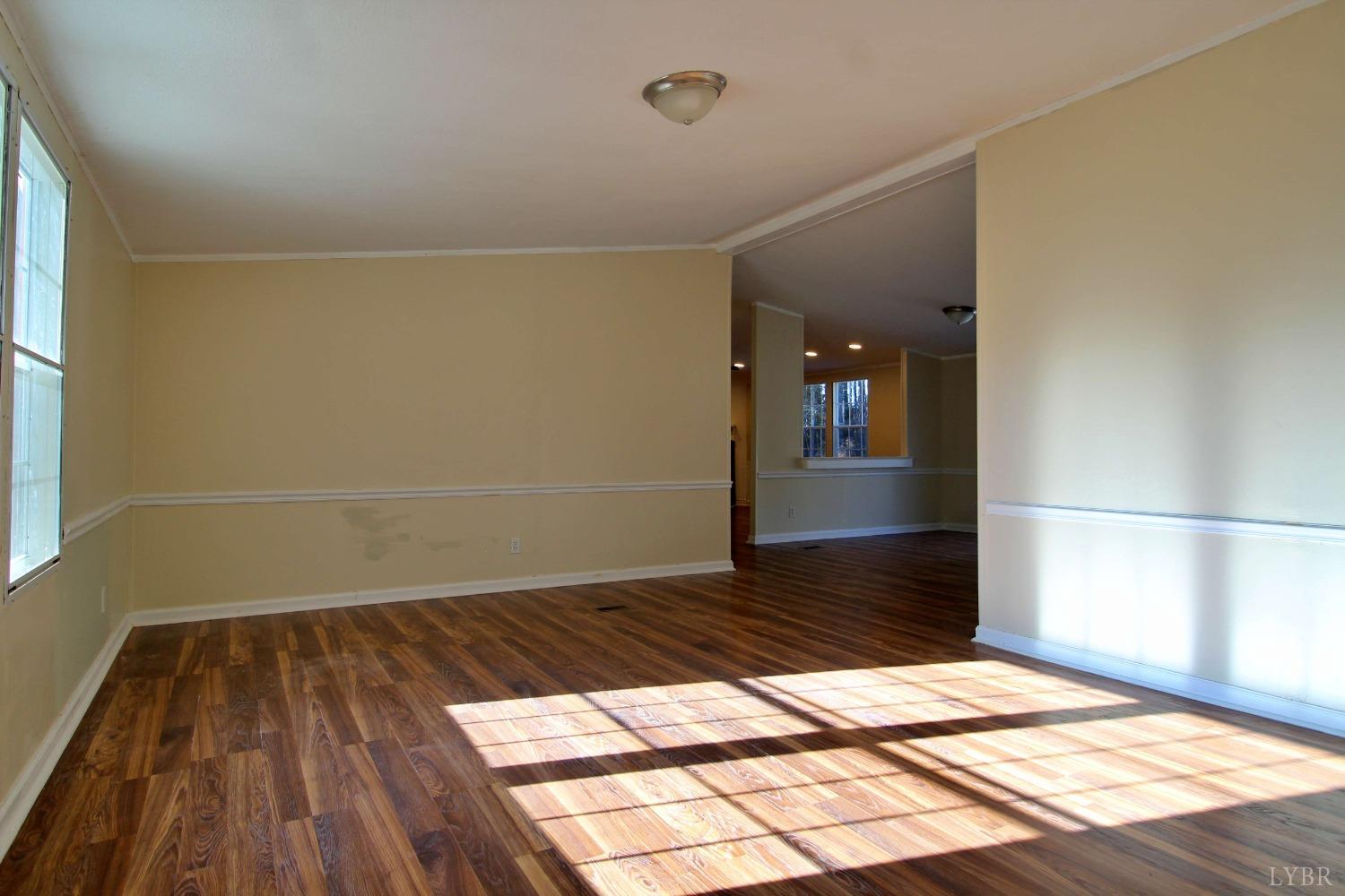 1908 Holiday Lake Road Appomattox, VA 24522 - Photo 2 of 35 a view of an empty room and window