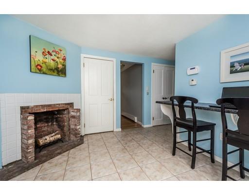 100 Carpenter Road Northbridge, MA 01588 - Photo 8 of 32 a living room with furniture and a fireplace