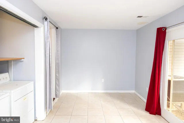 a view of a kitchen with a sink and a microwave