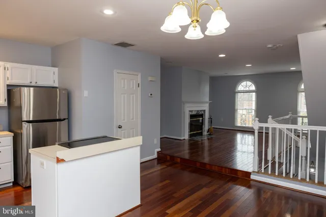 a view of dining room with wooden floor