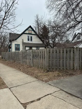 a front view of a house having yard