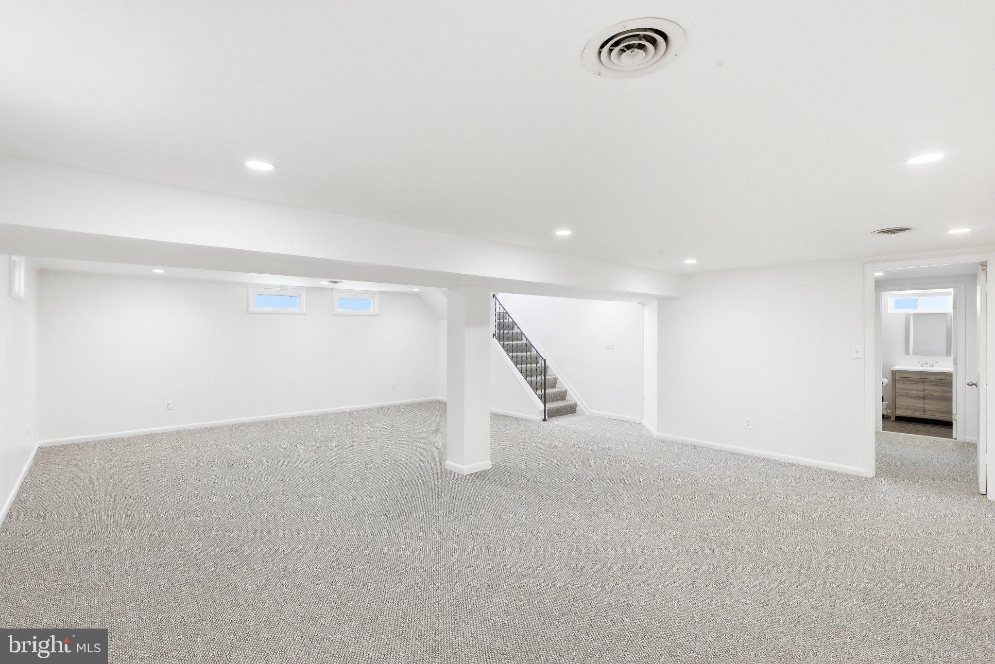 9005 Perring Park Road Baltimore, MD 21234 - Photo 14 of 20 an empty room with a projector