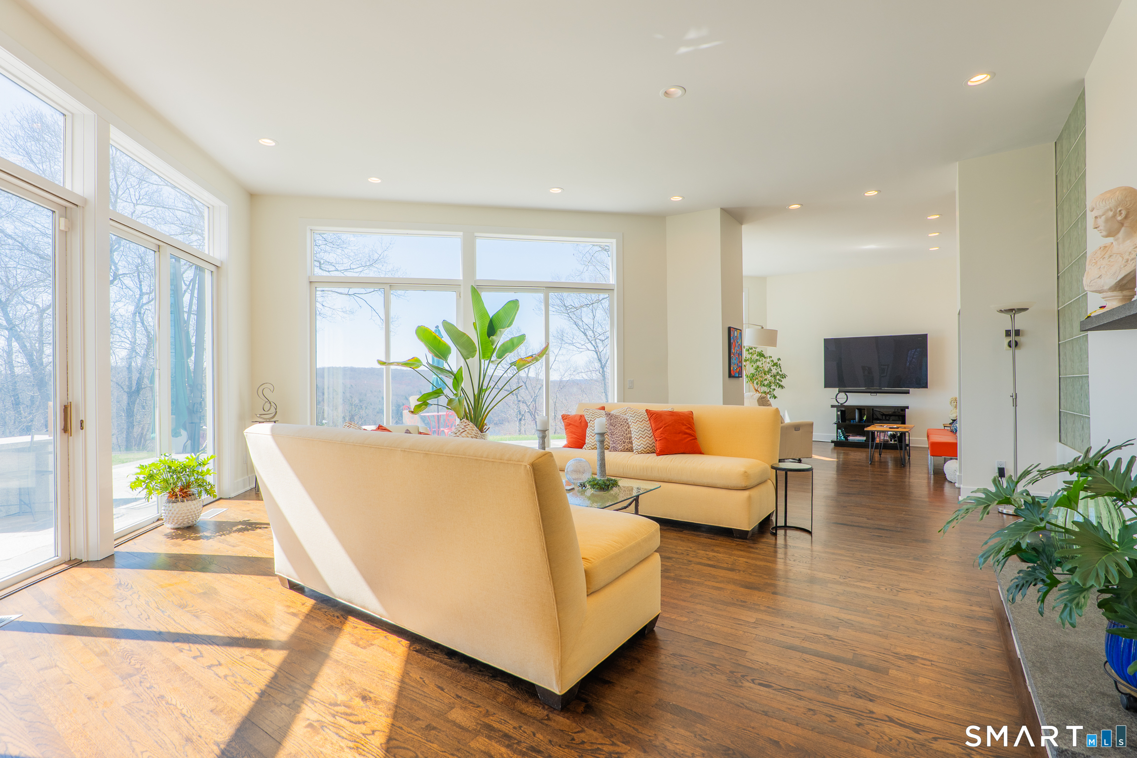 216 Kuhne Road Southbury, CT 06488 - Photo 11 of 40 a living room with furniture and a flat screen tv