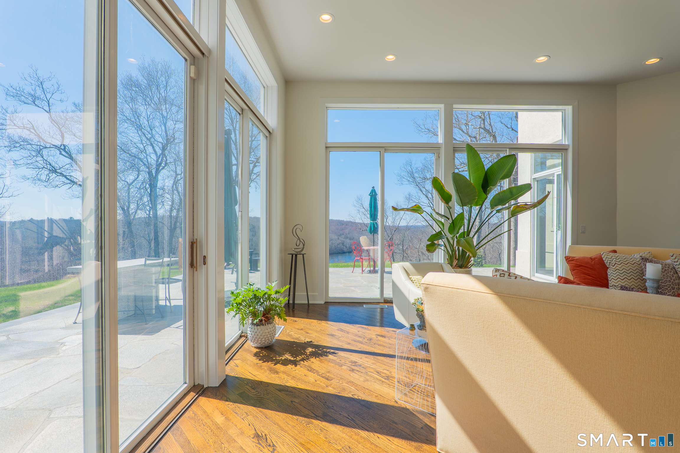 216 Kuhne Road Southbury, CT 06488 - Photo 13 of 40 a spacious bedroom with a large bed and a potted plant