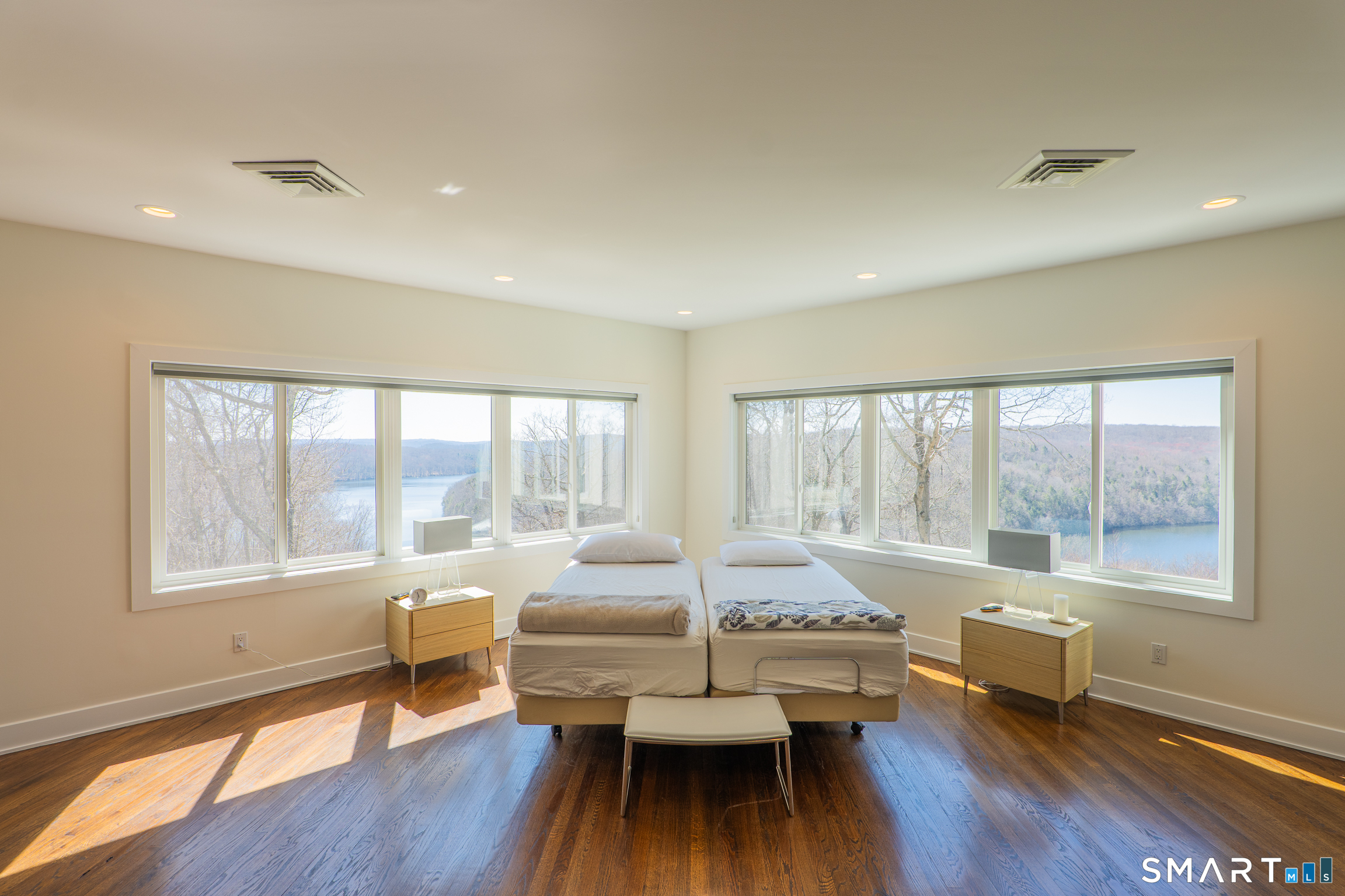 216 Kuhne Road Southbury, CT 06488 - Photo 16 of 40 a living room with furniture and a large window