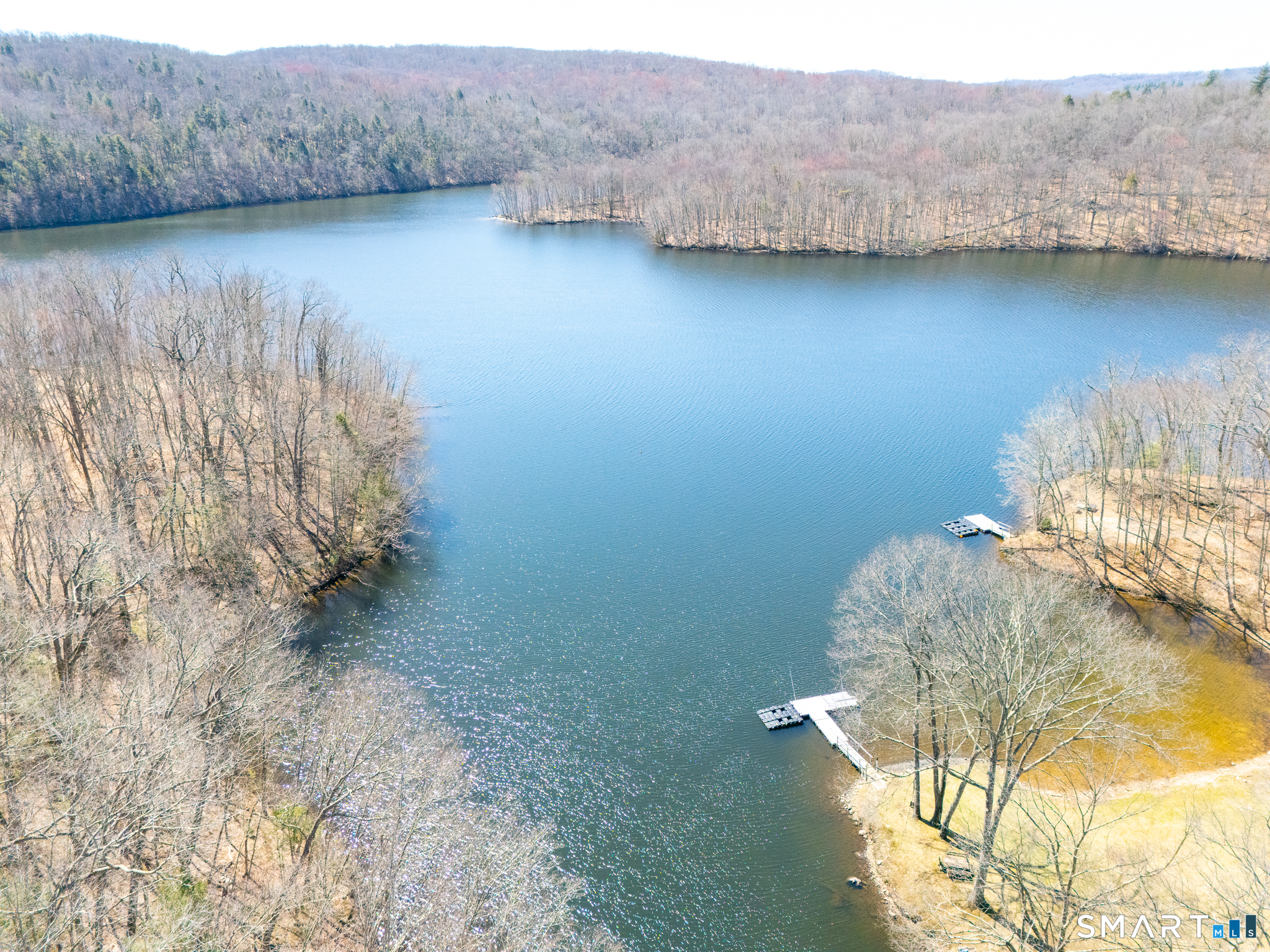 216 Kuhne Road Southbury, CT 06488 - Photo 38 of 40 a view of a couch in a room