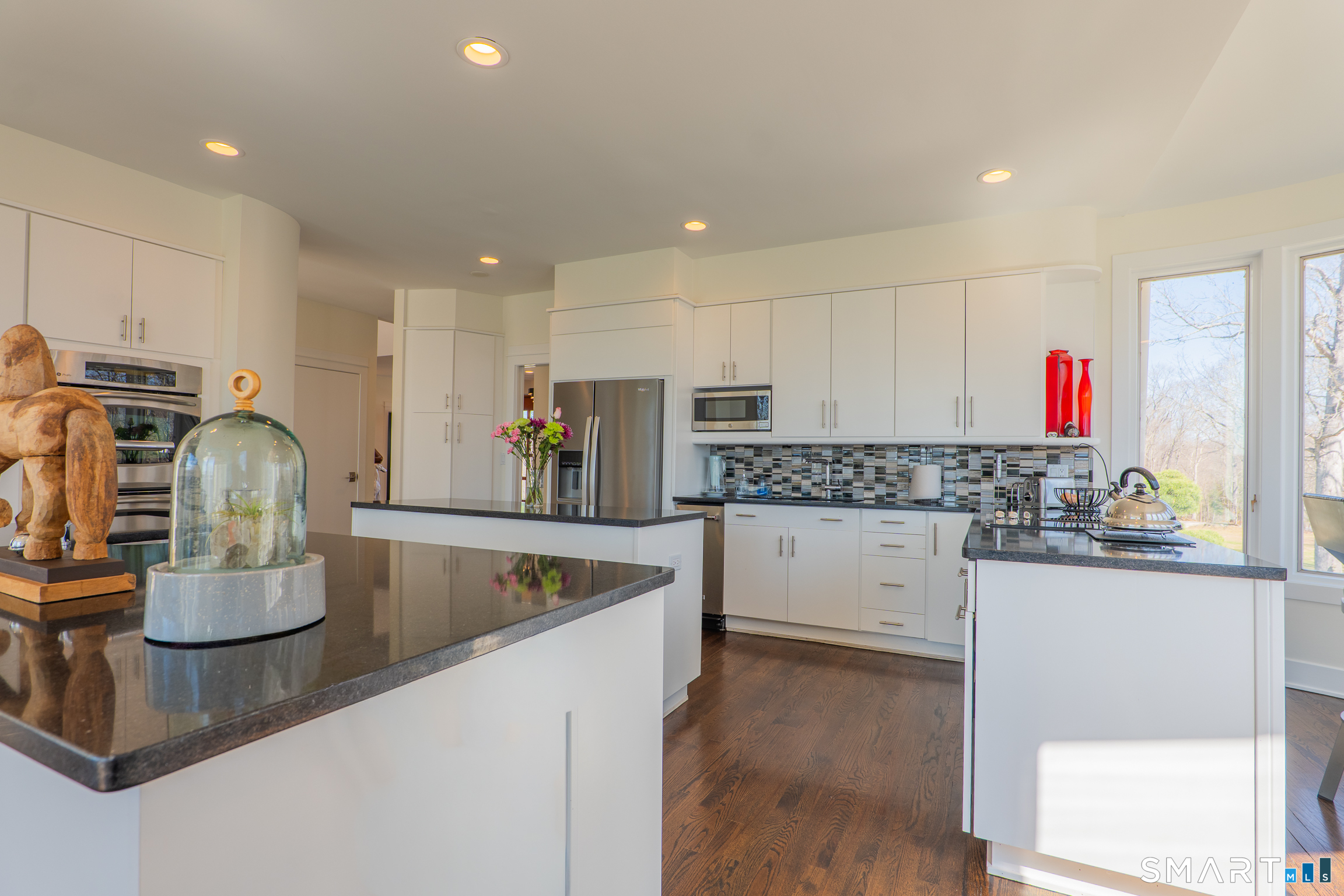 216 Kuhne Road Southbury, CT 06488 - Photo 6 of 40 a kitchen with counter top space cabinets and appliances