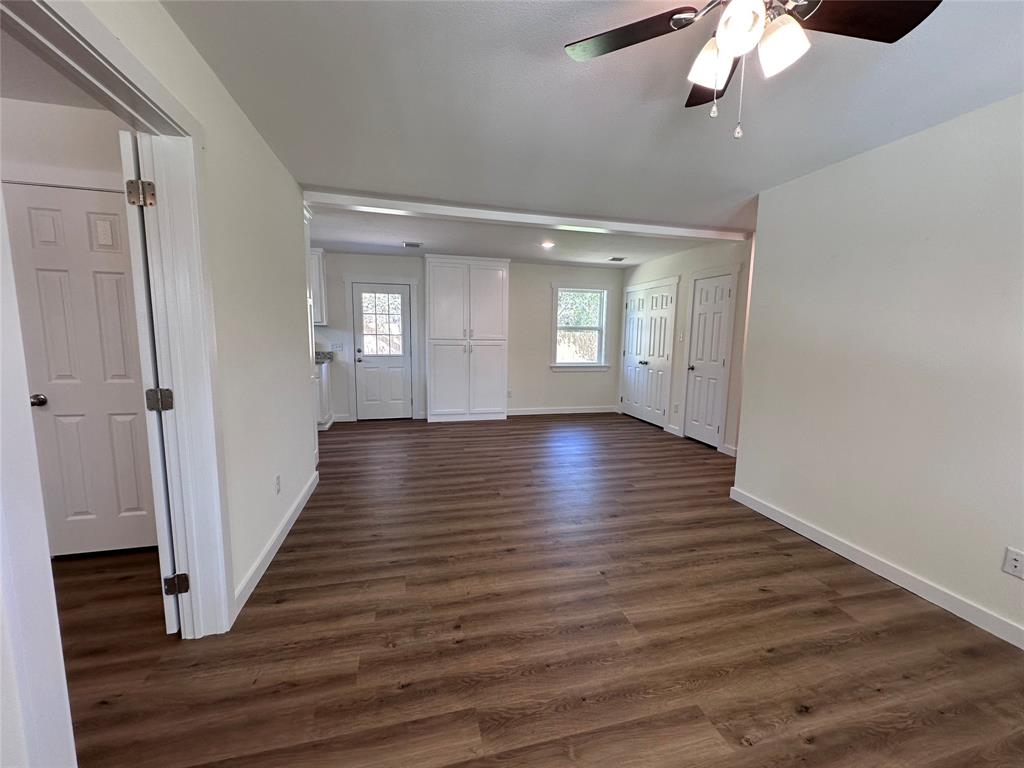 706 Barbara Street Athens, TX 75751 - Photo 2 of 13 a view of gallery with wooden floor