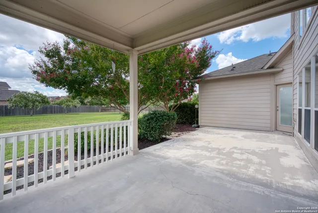 a view of a porch with a yard