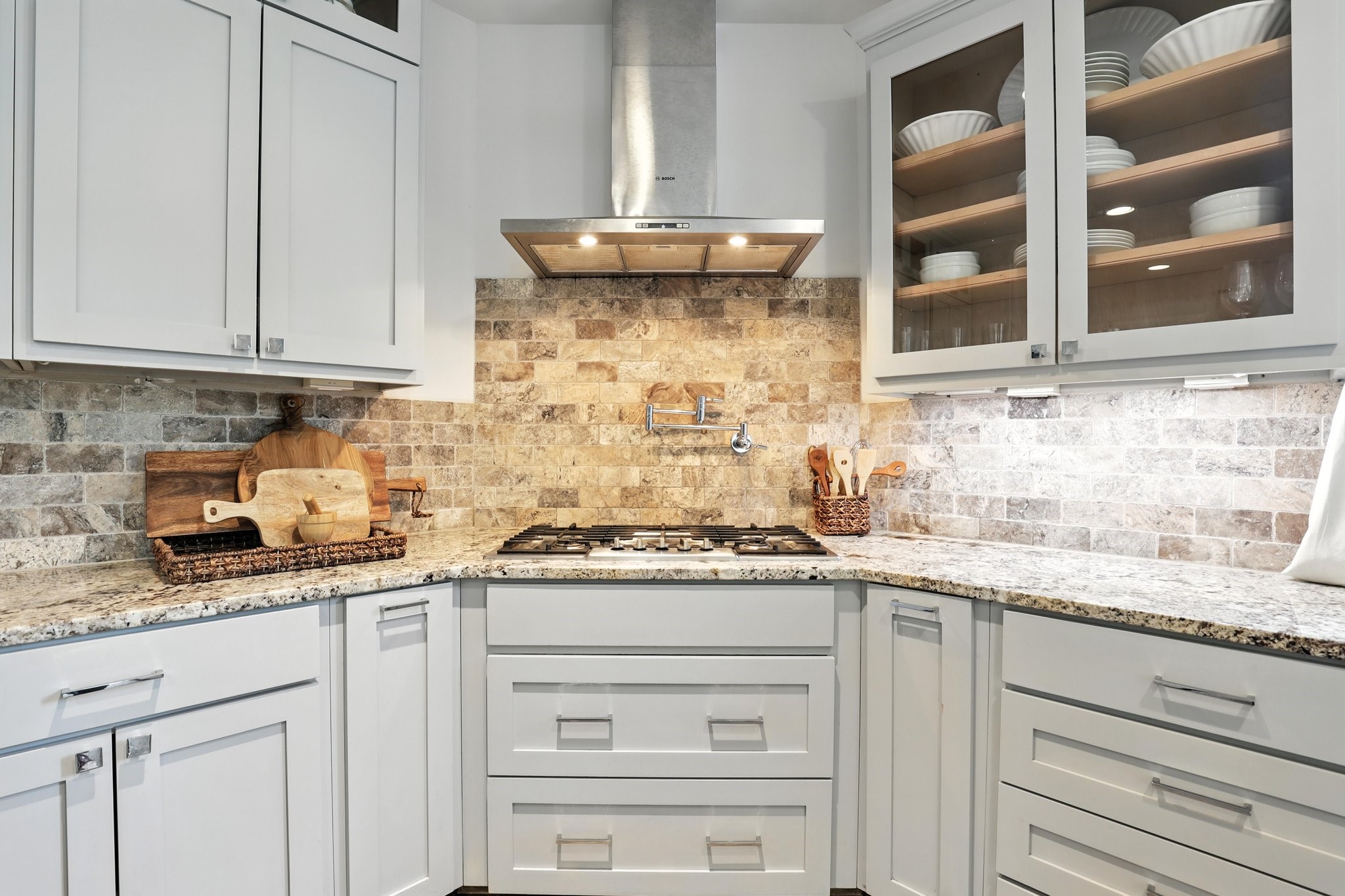 3202 Ozark Street Houston, TX 77021 - Photo 17 of 37 a kitchen with granite countertop stainless steel appliances white cabinets and a sink