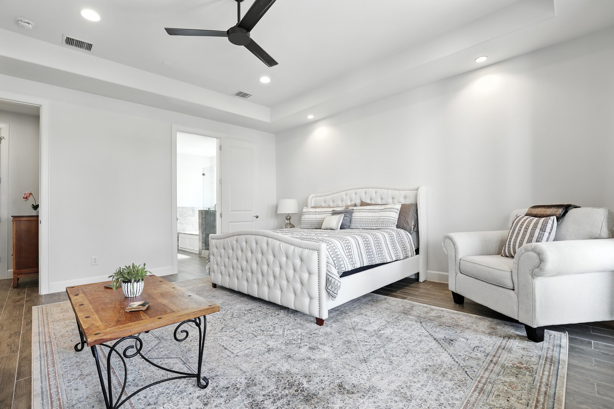 3202 Ozark Street Houston, TX 77021 - Photo 20 of 37 a bedroom with a white bed and white walls