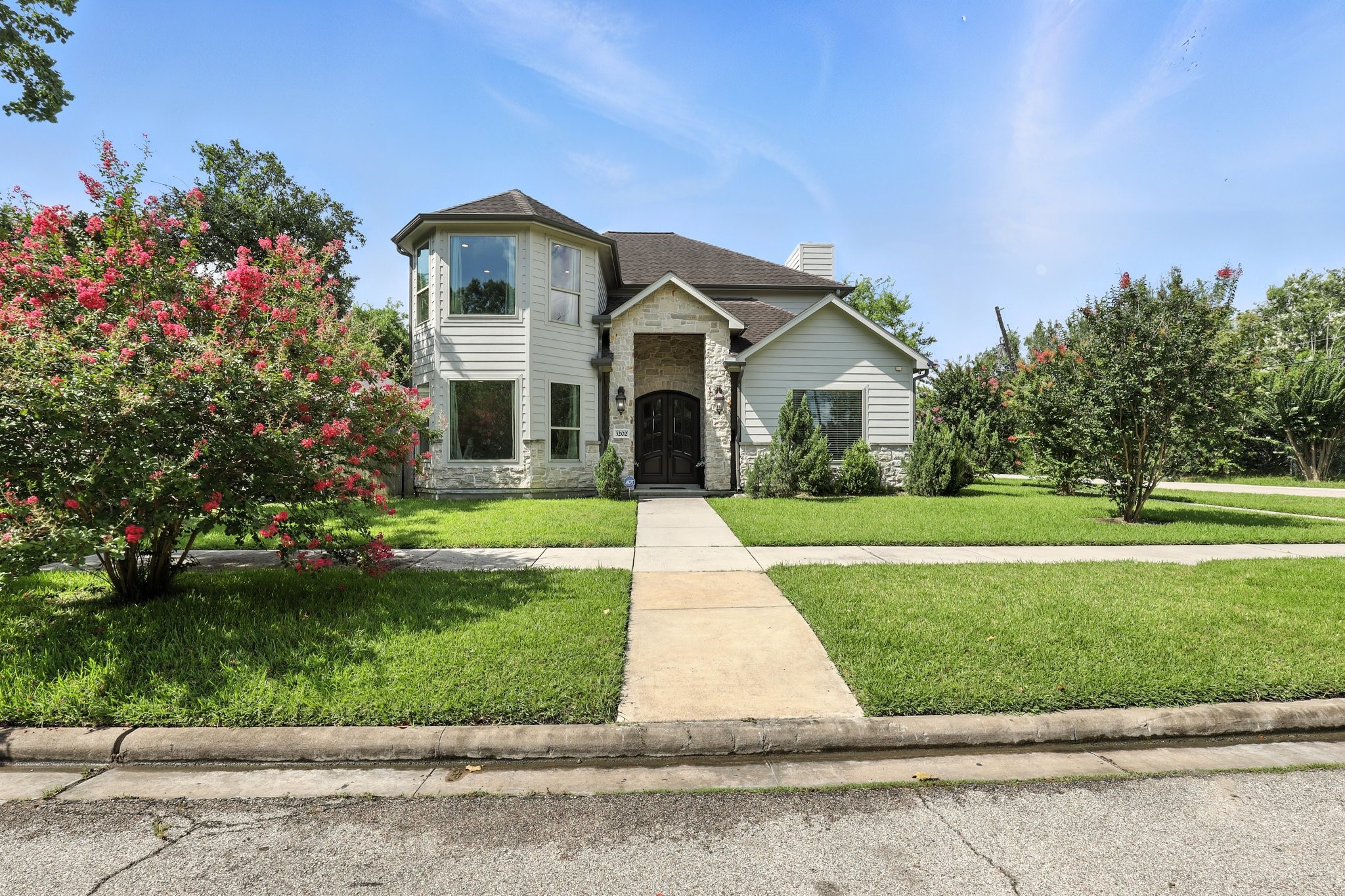 3202 Ozark Street Houston, TX 77021 - Photo 3 of 37 a front view of a house with a yard