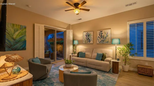 a living room with furniture and a window