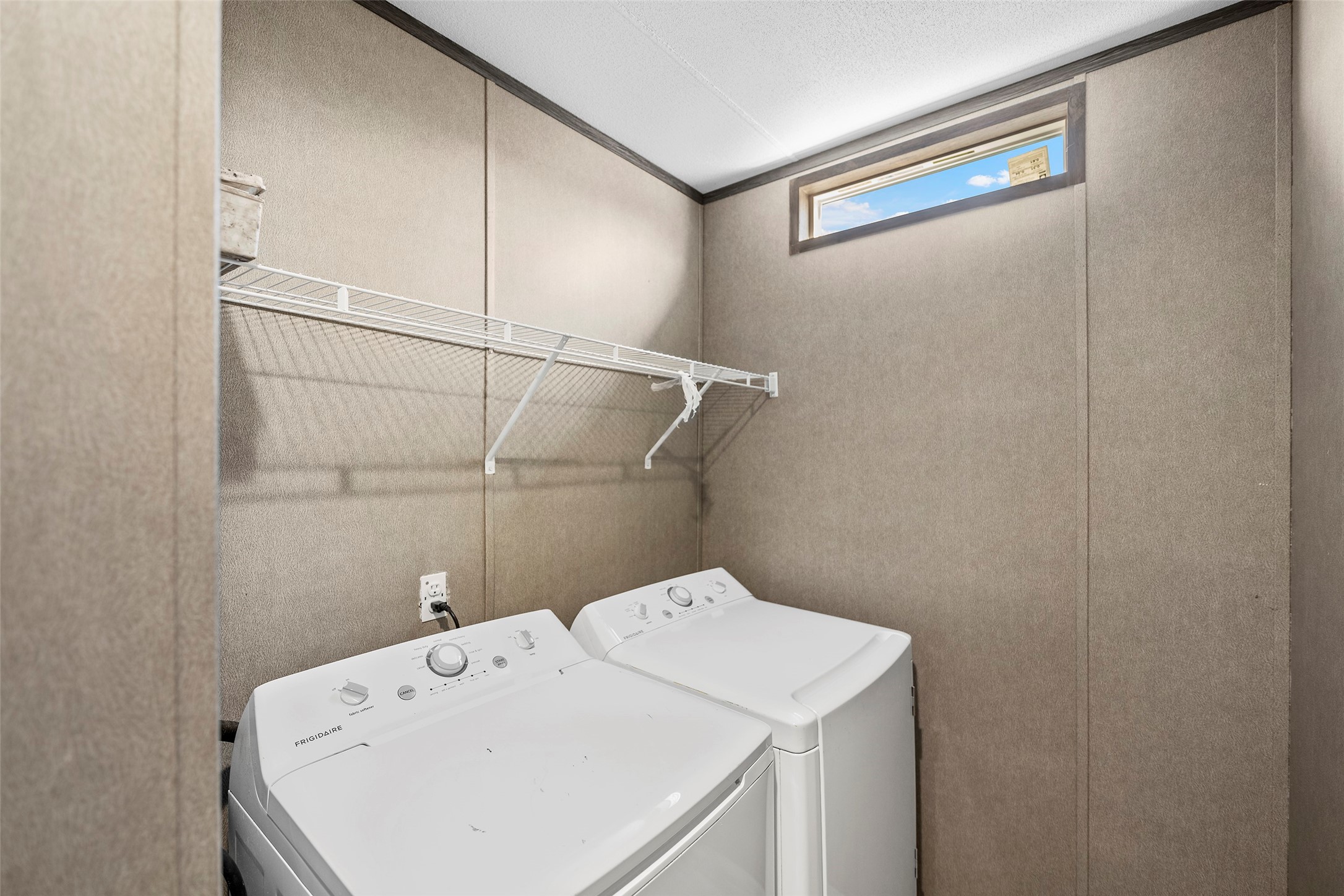 4343 Katy Hockley Road, Unit 27 Katy, TX 77493 - Photo 14 of 27 a utility room with dryer and washer