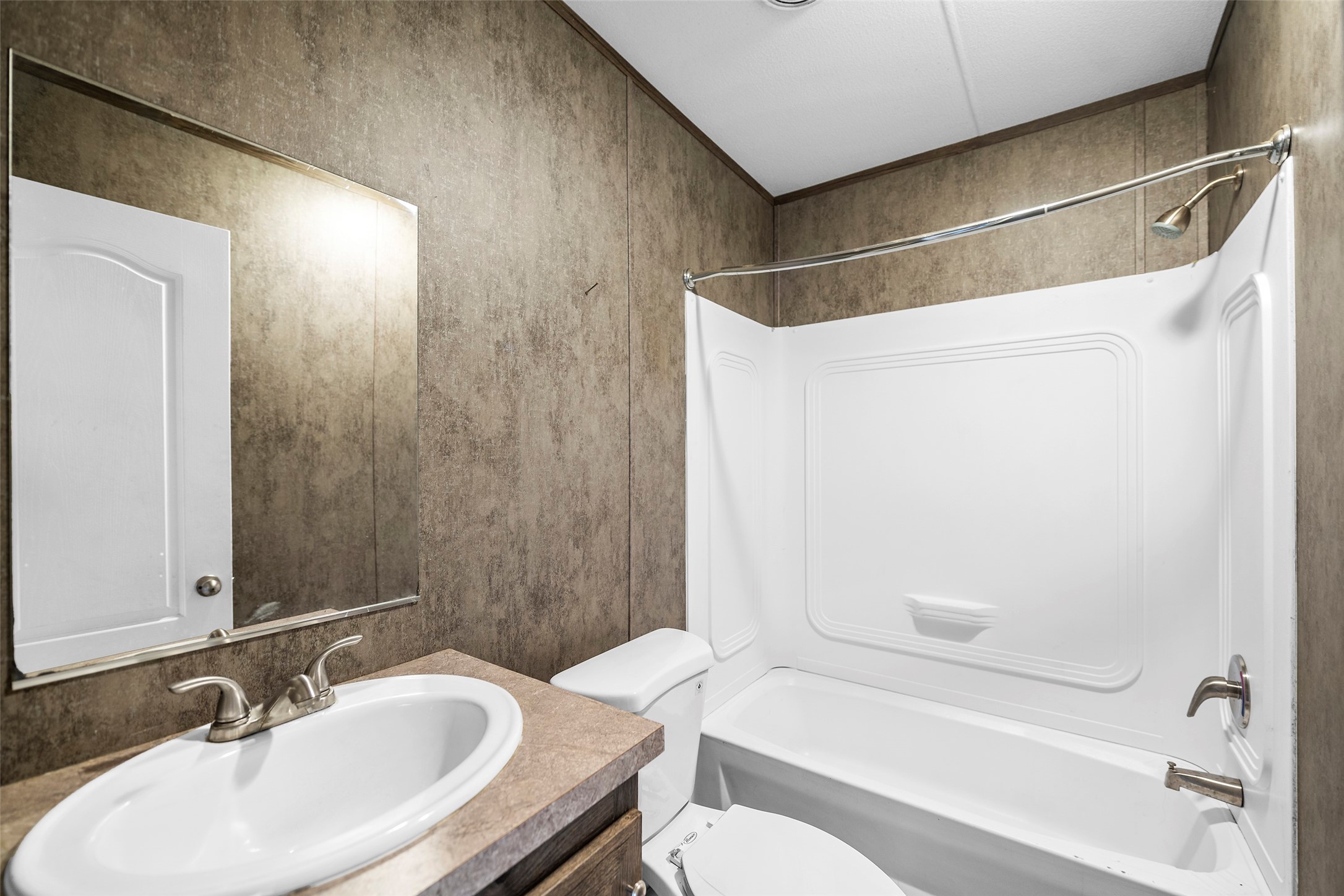 4343 Katy Hockley Road, Unit 27 Katy, TX 77493 - Photo 21 of 27 a bathroom with a sink toilet and shower