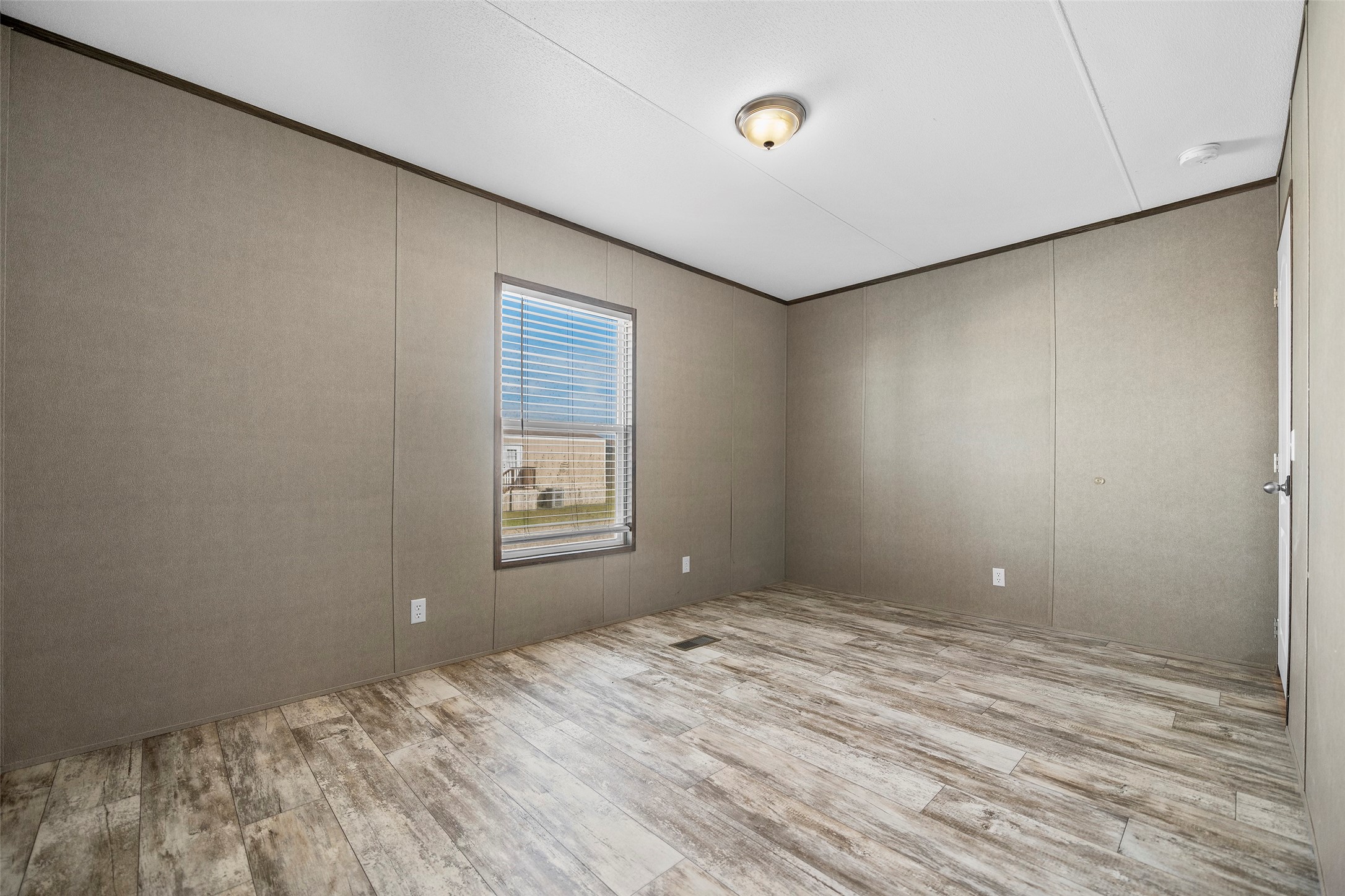 4343 Katy Hockley Road, Unit 27 Katy, TX 77493 - Photo 22 of 27 a view of empty room with wooden floor