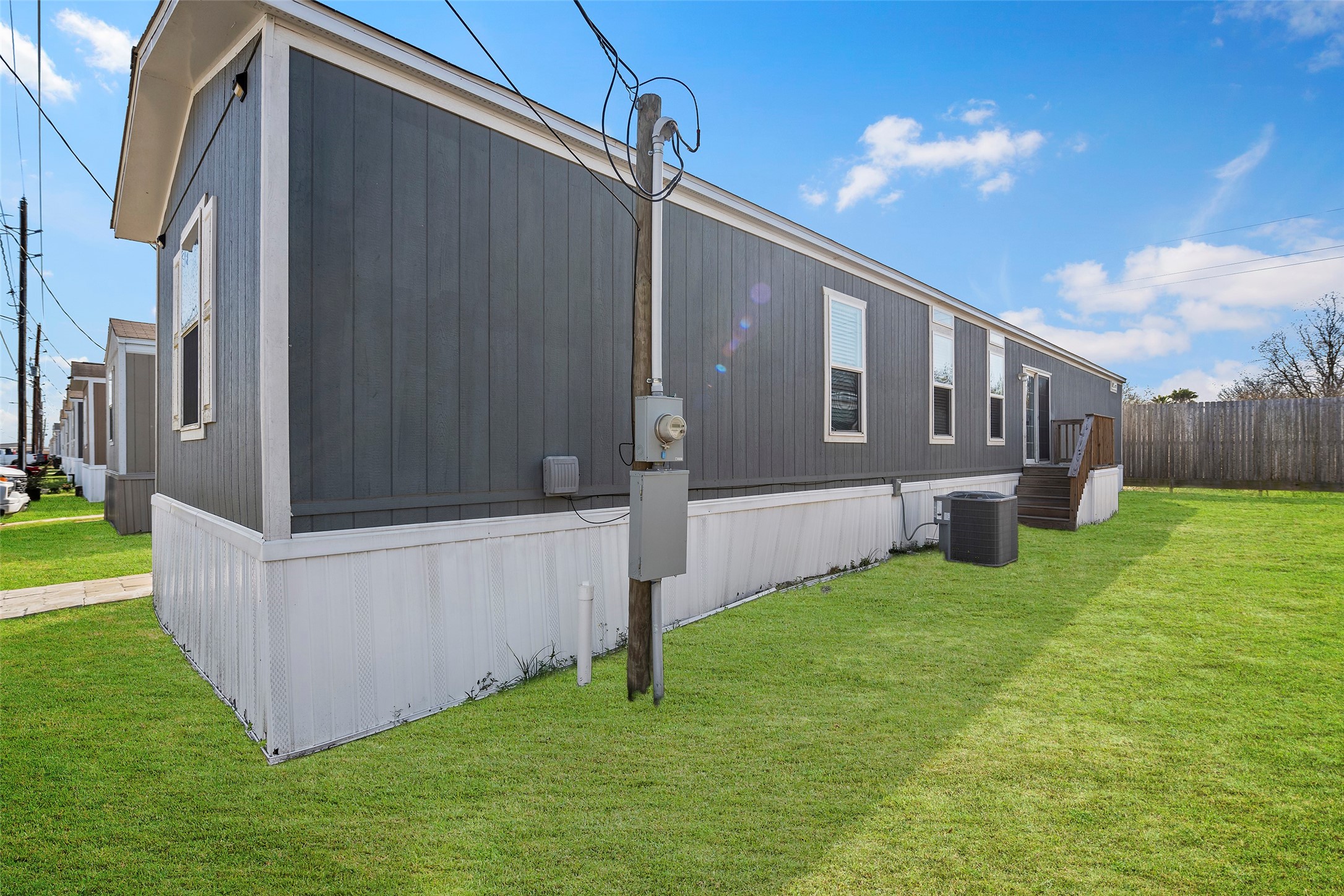 4343 Katy Hockley Road, Unit 27 Katy, TX 77493 - Photo 4 of 27 a view of a back yard of the house