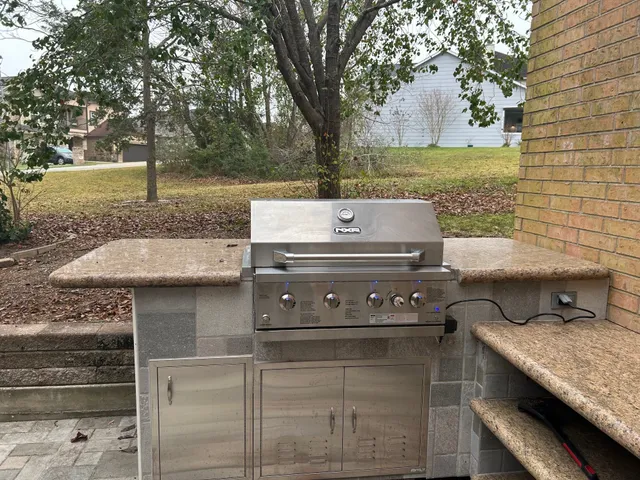 a view of a fireplace with a sink