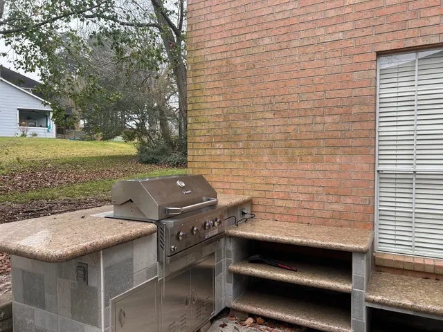 a view of a yard with outdoor seating