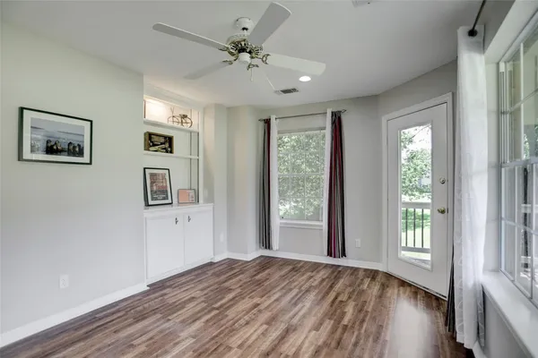 a view of balcony with furniture