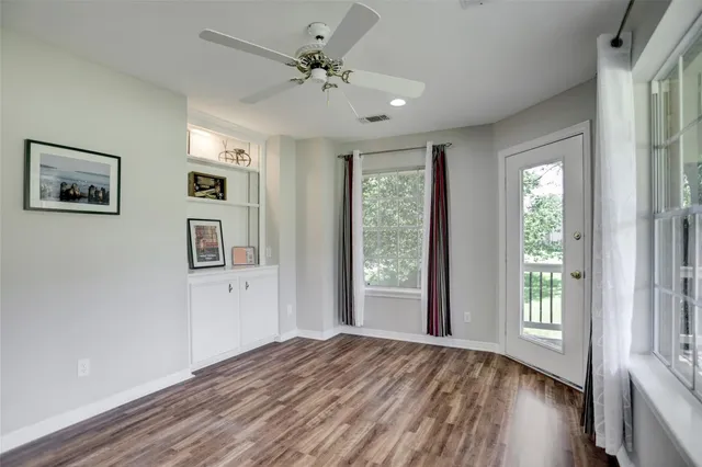 a view of balcony with furniture
