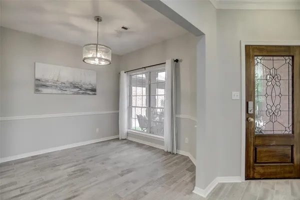 a view of livingroom with hardwood floor and window