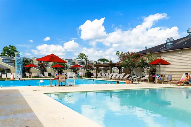 a view of a golf course with green space