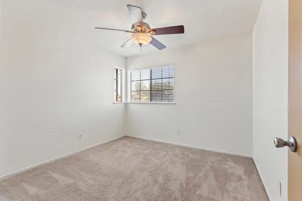 a view of a hallway with closet